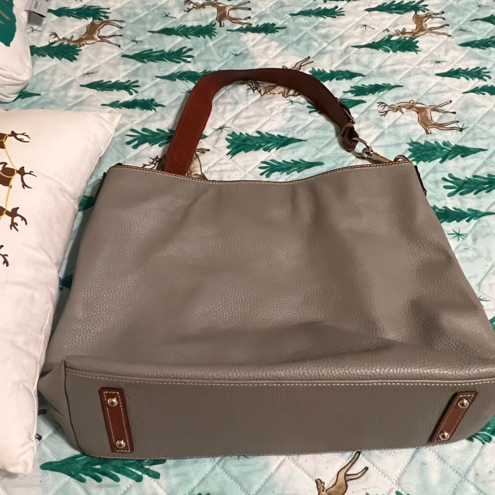 Dooney and Bourke used a few times. Excellent condition.